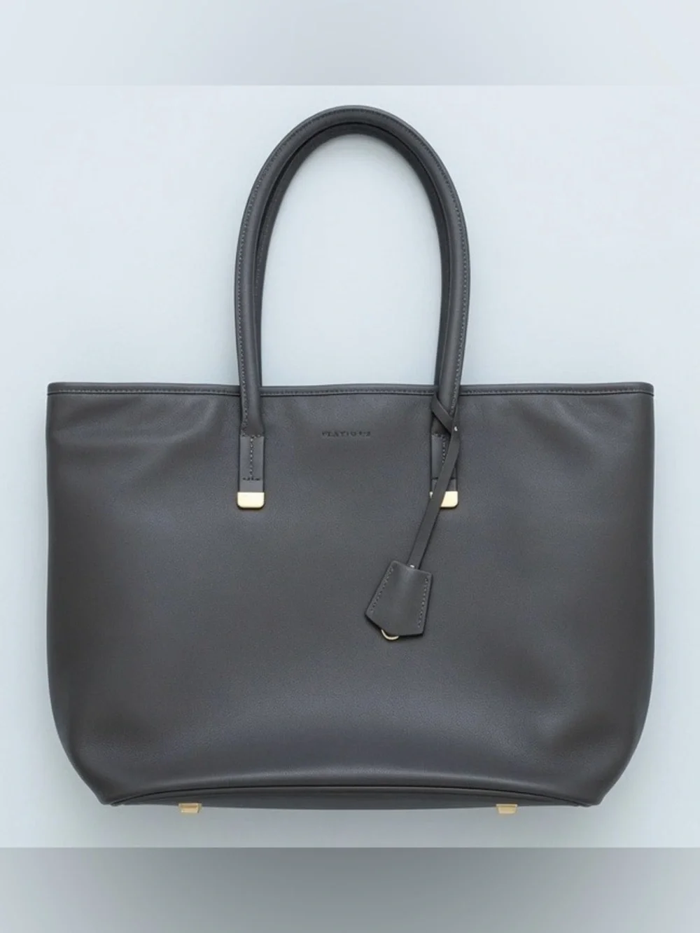 Platinum Avenue gray faux leather 15” laptop tote bag